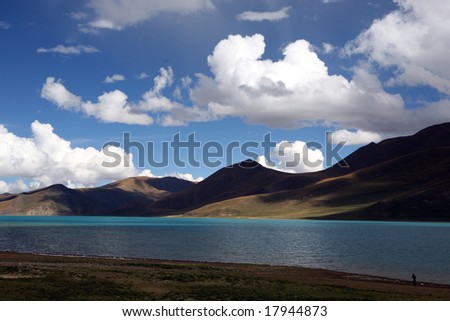 Clouds above the plateau lake, Lake Yamzho Yumco, in Tibet.
