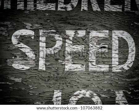 Speed on old weathered sign