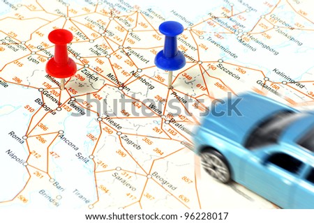 Driving a car on the map.Two points marked cities,Blue Prague Czech-Red Milan Italy.
