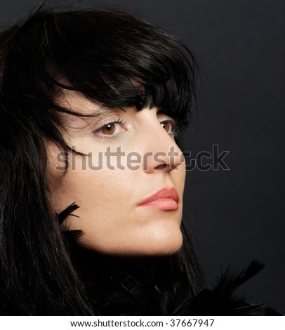 Beautiful clean cosmetics woman close up portrait over black