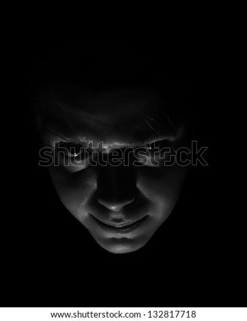 scary woman face in the darkness