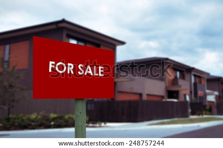 house for sale sign closeup