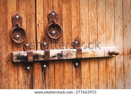 Old antique wooden gate lock