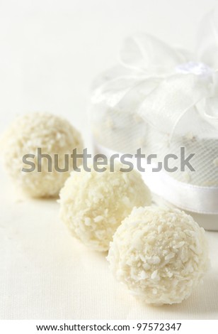 coconut candies and nice box over white