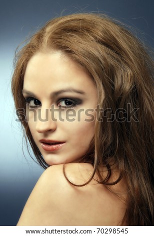 Sensual red hair woman studio shot, head and shoulder