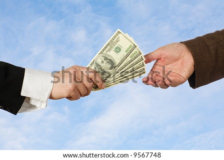 Concept of two people fighting over money / business transaction / giving & taking money / shopping / divorce / power struggle / etc.