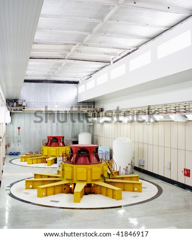 Huge water turbine generators. Hydroelectric powerplant. Interior