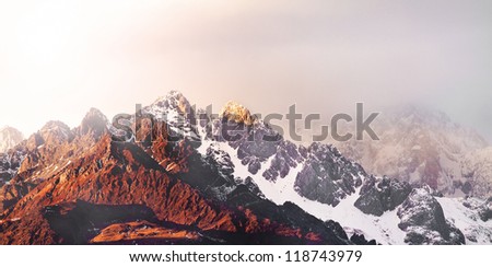 Landscape photo of Sunrise at the peak of Yulong Snow Mountain, with altitude of over 5000 meters high in Yunnan Province, south west of China