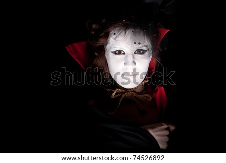 closeup portrait of a young female vampire