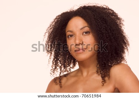 Mid adult ethnic woman of mixed racial background African-American and Latina