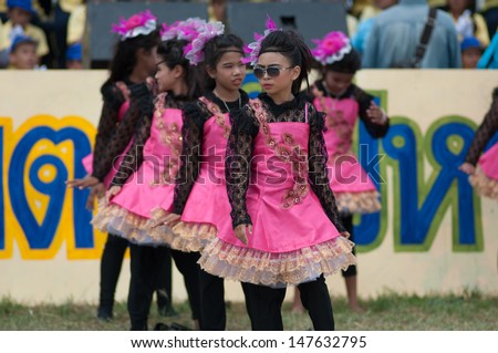 KO SAMUI,SURAT THANI - JULY 17 : Unidentified Thai students 13 - 16 years old cheer leaders in ceremony uniform during sport parade on July 17, 2013 in ko samui, Surat Thani, Thailand.
