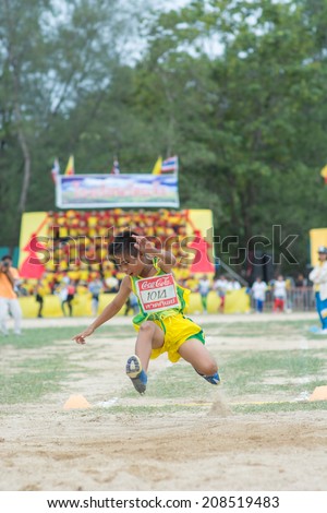 KO SAMUI,SURAT THANI - JULY 23 : Unidentified Thai students 6-18 years old athletes in action during sport day on July 23, 2014 in ko samui, Surat Thani, Thailand.