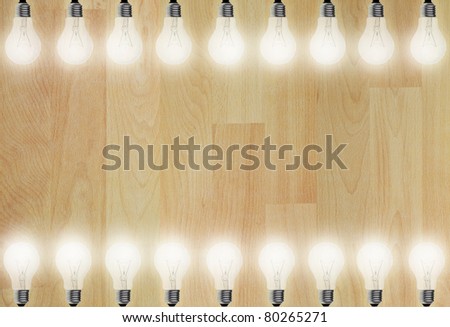 art work of wood floor and light bulbs frames