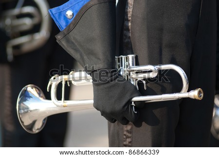 Musical instrument in hand of marching band.