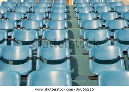 Row of chairs in the stadium.