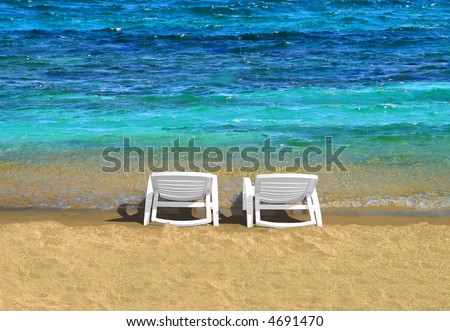 Crystal Blue Waters, Sandy Beach and 2 chairs for sunbathing