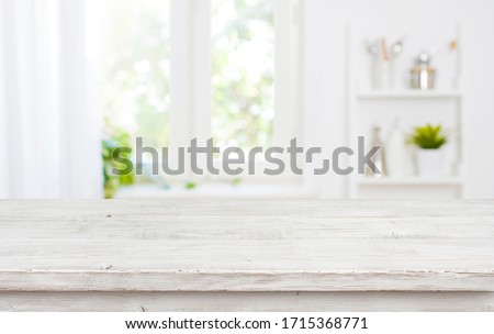 Free space table top background on blurred kitchen window interior Foto stock © 