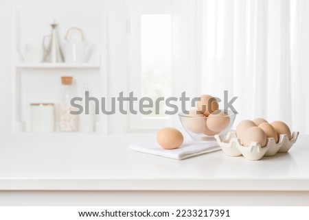 Similar – Image, Stock Photo Chicken eggs on napkin on wooden table