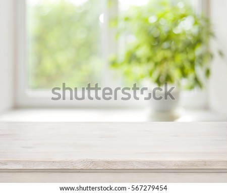 Similar – Foto Bild Fenster mit Grünpflanze und Gebäudereflexion