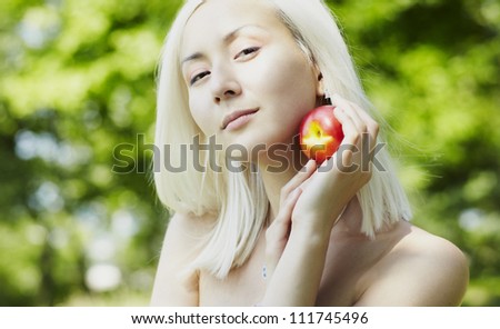 Young asian woman with perfect skin over summer background