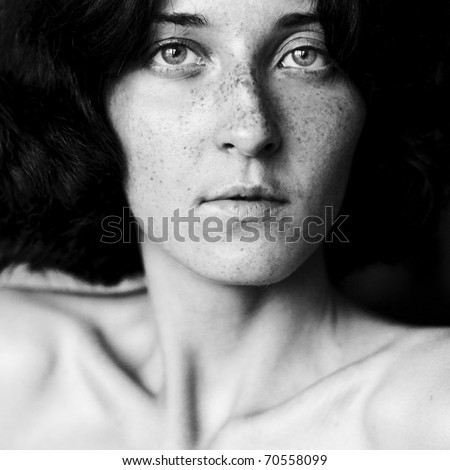 Close-up portrait of serious-looking woman