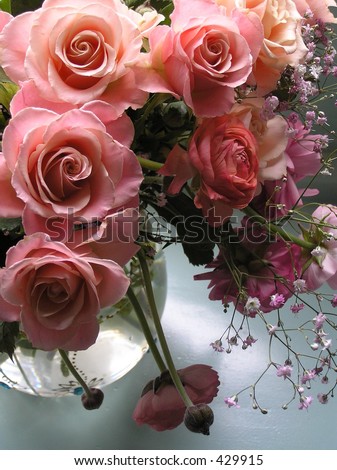 still life photograph with extraordinary colored champagne roses with beautiful lighting
