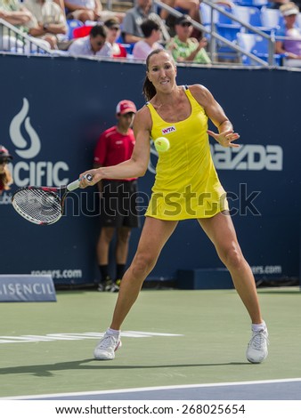 MONTREAL - AUGUST 6: Jelena Jankovic of Serbia in her Second round match win over Sloane Stephens of USA at the 2014 Rogers Cup on August 6, 2014 in Montreal, Canada