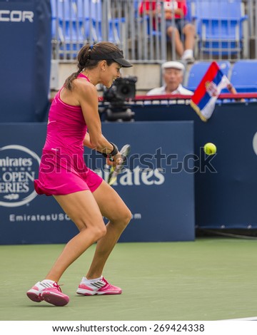 MONTREAL - AUGUST 5: Ana Ivanovic of Serbia in her Second round match win over Timea Bacsinszky of Switzerland at the 2014 Rogers Cup on August 5, 2014 in Montreal, Canada