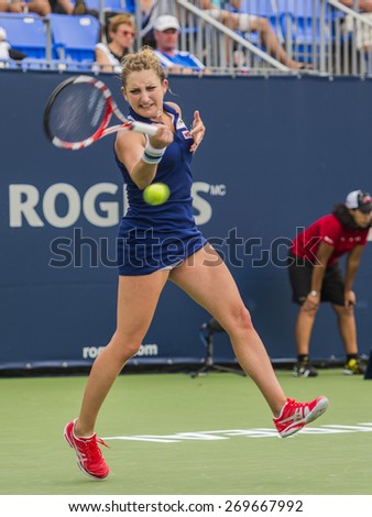 MONTREAL - AUGUST 5: Timea Bacsinszky of Switzerland in her Second round match loss to Ana Ivanovic of Serbia at the 2014 Rogers Cup on August 5, 2014 in Montreal, Canada