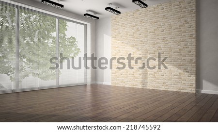 Empty room with brick wall and dark floor