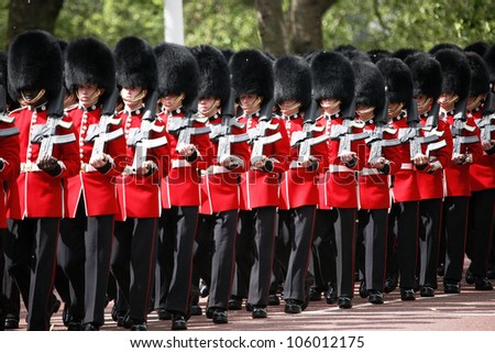 LONDON - JUNE 16: Queen\'s Soldier at Queen\'s Birthday Parade on June 16, 2012 in London, England. Queen\'s Birthday Parade take place to Celebrate Queen\'s Official Birthday in every June in London.