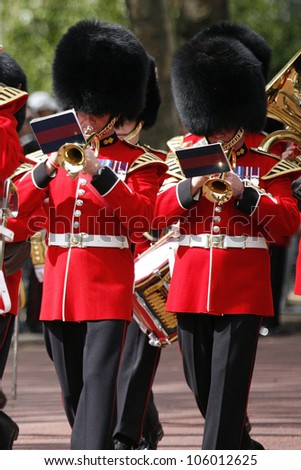 LONDON - JUNE 16, 2012: Queen\'s Bands at Queen\'s Birthday Parade. Queen\'s Birthday Parade take place to Celebrate Queen\'s Official Birthday in every June in London.