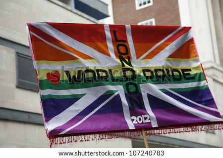 LONDON - JULY 7: Rainbow flag in London\'s Gay Pride, 2012 Worldpride on July 7, 2012 in London, UK, estimated 25,000 people took part in the march, Parade to support gay rights.
