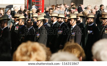 LONDON - NOV 13 : People, Gurkha, take part in Remembrance Day, Poppy Day or Armistice Day, 11th every Nov, to remember armed forces have died since I World War, Parade on Nov 13, 2011, London, UK.