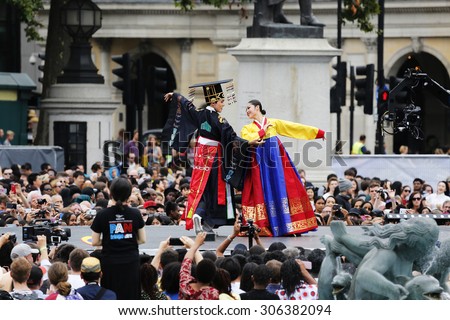 LONDON - AUGUST 9: Korean ethnic dancers perform,Royal Wedding Dance, in Korean Festival at Trafalgar Square on August 9, 2015 in London, UK.