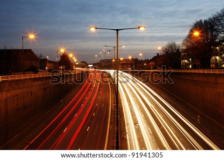 Traffic Road at Night. Long exposure of busy road at dawn.