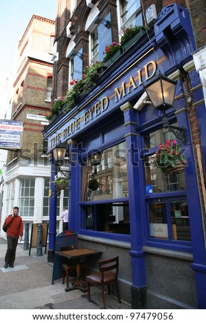 LONDON - AUG 17: Exterior of pub, for drinking and socializing, focal point of the community, on Aug 17, 2010, London, UK. Pub business, now about 53,500 pubs in the UK, has been declining every year