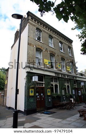 LONDON - SEP 16: Exterior of pub, for drinking and socializing, focal point of the community, on Sep 16, 2010, London, UK. Pub business, now about 53,500 pubs in UK, has been declining every year