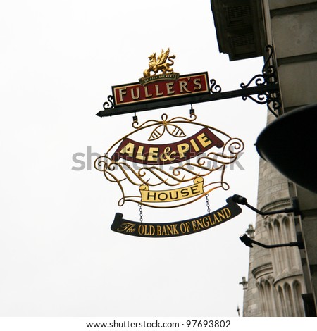 LONDON - MAY 8: English pub sign, Public house, known as pub, is focal point of the community, on May 8, 2010, London, UK. Pub business, now about 53,500 pubs in UK, has been declining every year