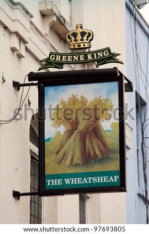 LONDON - JULY 21: English pub sign, Public house, known as pub, is focal point of the community, on July 21, 2010, London, UK. Pub business, now about 53,500 pubs in UK, has been declining every year