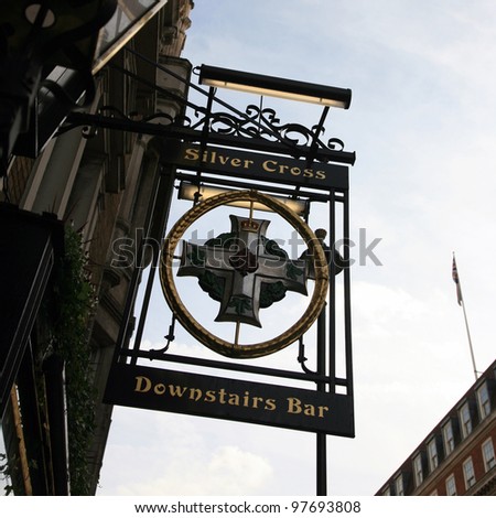 LONDON - OCT 18: English pub sign, Public house, known as pub, is focal point of the community, on Oct 18, 2010, London, UK. Pub business, now about 53,500 pubs in UK, has been declining every year