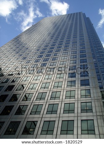 Modern skyscraper with blue sky background