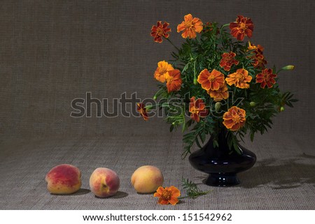 Classic still life with bright flowers and fruits