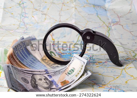 Currency on a map of Berlin.Germany.