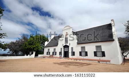 A traditional Cape Dutch homestead on a wine farm called Groot Constantia, Cape Town, South Africa