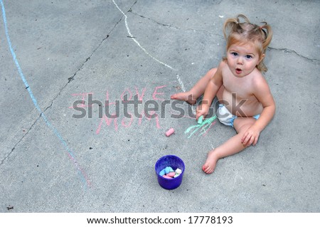 Baby girl sits on the sidewalk and looks up surprised at being caught writing with  sidewalk chalk.  She has written \