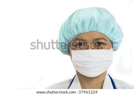 Head and shoulders portrait of Nurse with surgical mask and hair cap