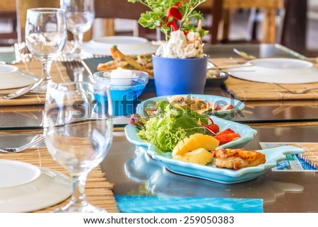 table setup in outdoor cafe, small restaurant in a hotel, summer vacations, meal time