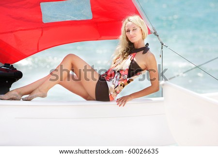 beautiful woman on sea yacht