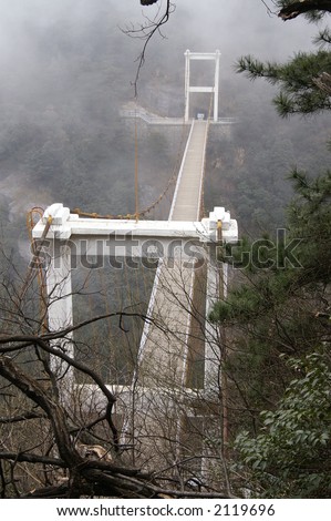 bridge across canyon, in China\'s famous beauty spot Lushan